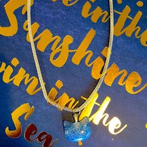 14” handmade silvertone necklace kitty pendant - opaque white with blue glitter.